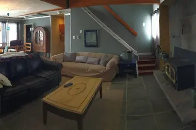 a living room with a couch and a coffee table at Casa Vista in Fraser