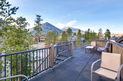 a balcony with chairs and a view of mountains at Frisco Condo with Rooftop Deck Walk to Main St! in Frisco
