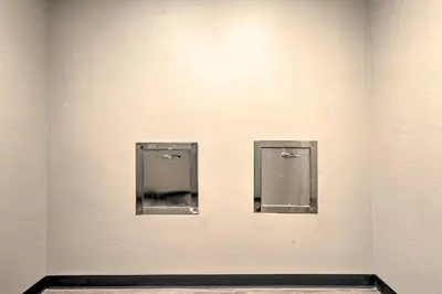 two urinals on a wall in a room at Condo with View - 1 Block to Main St - 4 Mi to Ski! in Winter Park