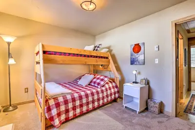 a bedroom with a bunk bed in a house at 7 Mi to Ski Waterfront Townhome in Frisco! in Frisco