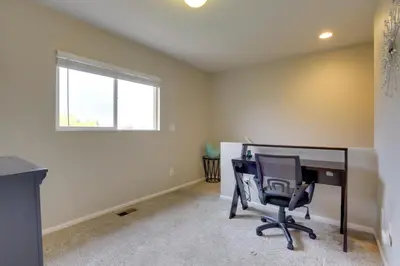 an office with a desk and a chair at Denver Getaway Close to Downtown, Mtns, and Boulder in Thornton