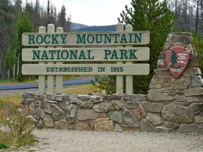 a sign for the rocky mountain national park at Cozens Pointe E 102 condo in Fraser