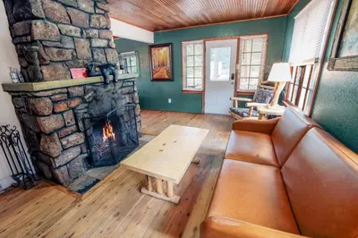 a living room with a couch and a fireplace at Monte Verde by Rocky Mountain Resorts- #20NCD0297 in Estes Park