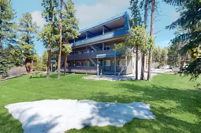 a large building with a lawn in front of it at Hi Country Haus 6-15 in Winter Park