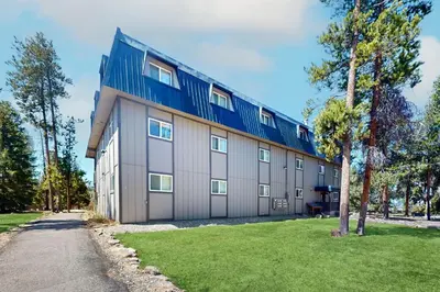 a large building with a blue roof at Hi Country Haus 6-15 in Winter Park