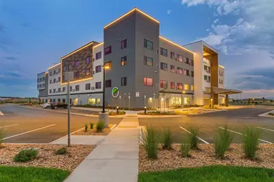 a large building with a street in front of it at Element Denver International Airport in Denver