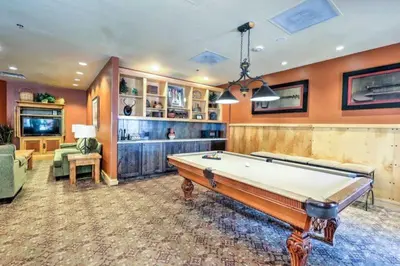 a large room with a pool table in it at Premier 2 Bedroom Mountain Condo In River Run Village With Expansive Mountain Views And Walking Distance To Ski Slopes in Keystone