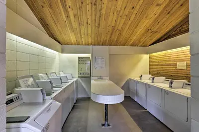 a bathroom with a row of sinks and toilets at Hot Tub and Ski Shuttle Access Keystone Condo! in Keystone