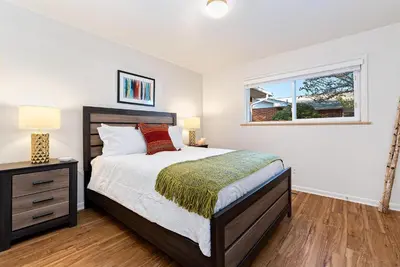 a bedroom with a bed and a window at Centrally Located Townhome Near PVH - Dog Friendly in Fort Collins