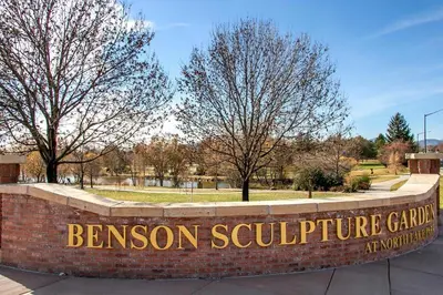 a sign for the entrance to a brenson sculpture garden at Comfortable Abode Near Historic Downtown in Loveland