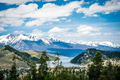 a view of a lake and snow covered mountains at 3 Mi to Keystone Resort Condo with Mountain View in Keystone