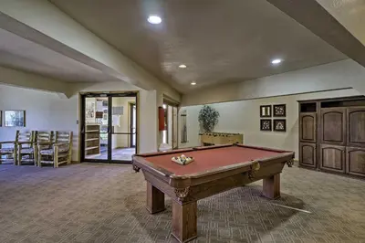 a large room with a pool table in it at Deck and Mtn View Keystone Townhome Near Resort! in Keystone