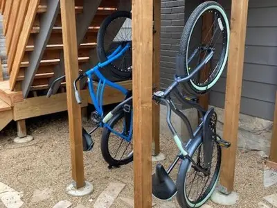 a blue bike is parked under a table at The Chic Guest Retreat in Old Town near CSU in Fort Collins