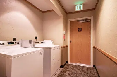 an empty laundry room with a washer and dryer at 2800 Slopeside condo in Keystone