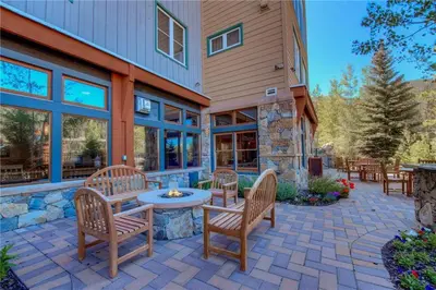 a patio with chairs and a table in front of a building at Black Bear 2 Bed 2 Bath BBCS in Dillon