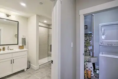 a bathroom with a sink and a mirror at Winter Park Condo with Fireplace - 4 Mi to Slopes! in Winter Park