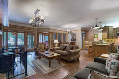 a living room with a couch and a table at Chateaux DuMont 2716 in Keystone
