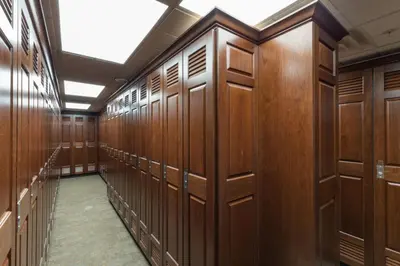 a row of wooden lockers in a dressing room at Dakota Lodge by Summit County Mountain Retreats in Keystone