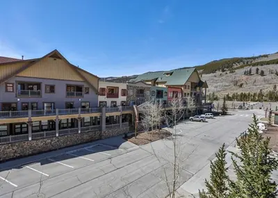 an empty parking lot in front of a resort at Dakota Lodge by Summit County Mountain Retreats in Keystone