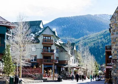 a street in a ski resort with a mountain at Jackpine Lodge by Summit County Mountain Retreats in Keystone