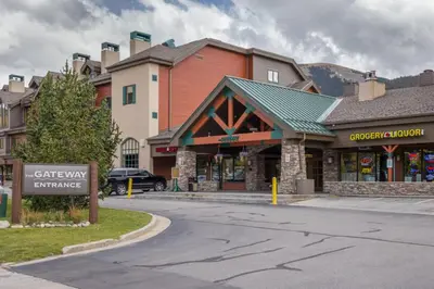 a street in a town with a sign in front of a building at Snake River Village by Summit County Mountain Retreats in Keystone