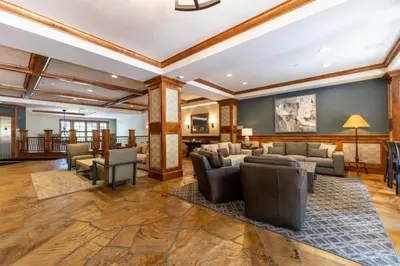 a large living room with couches and chairs at Lone Eagle by Summit County Mountain Retreats in Keystone