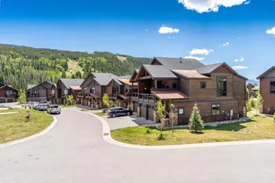 an aerial view of a house with a driveway at River Run Townhomes by Summit County Mountain Retreats in Keystone