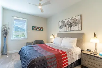 a bedroom with a bed and a window at Sail Lofts by Summit County Mountain Retreats in Dillon