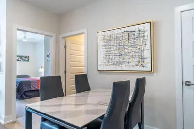 a dining room with a table and chairs at Sail Lofts by Summit County Mountain Retreats in Dillon