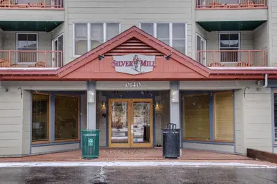 a building with a sign that reads supper inn at Silver Mill by Summit County Mountain Retreats in Keystone