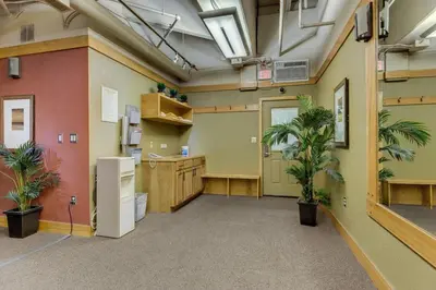 an empty office with plants in a room at Silver Mill by Summit County Mountain Retreats in Keystone