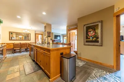 a kitchen with a sink and a counter top at Springs by Summit County Mountain Retreats in Keystone