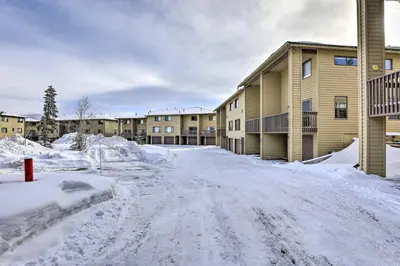a snow covered street in front of a building at 8 Mi to Copper Mtn Sleek Frisco Townhome with Views in Frisco
