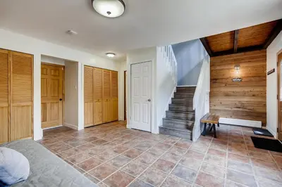 a room with a staircase and a stair case at Mount Royal Condos #501 condo in Frisco