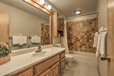 a bathroom with a sink and a toilet and a tub at Resort Perks and Trail Access Silverthorne Condo! in Silverthorne