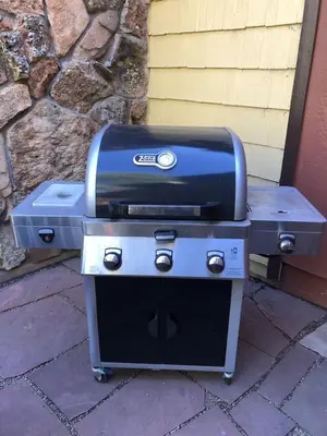 a grill sitting on top of a stove at Riverfront Mountain Cottage Retreat in Estes Park
