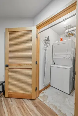 a kitchen with a washer and dryer in a room at Cutty Sark Court #2 3BR Mountain Views townhouse in Silverthorne