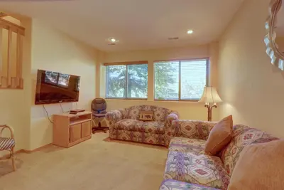 a living room with a couch and a tv at 75 Corinthian 3Br 3Ba Spacious Layout, Private Garage townhouse in Dillon