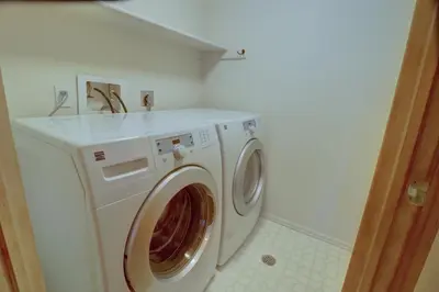 a washer and dryer in a laundry room at 75 Corinthian 3Br 3Ba Spacious Layout, Private Garage townhouse in Dillon