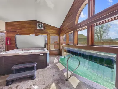 a bathroom with a tub and a swimming pool at 75 Corinthian 3Br 3Ba Spacious Layout, Private Garage townhouse in Dillon