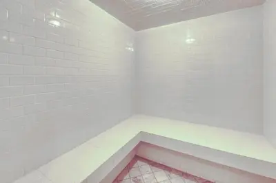 a corner of a room with white brick walls at Jackpine Lodge 2 Bedroom Condo in Keystone