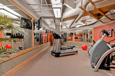 a gym with treadmills and elliptical machines at 8166 Silver Mill in Keystone