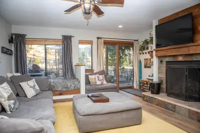a living room with a couch and a fireplace at 1221 Keystone Gulch condo in Keystone