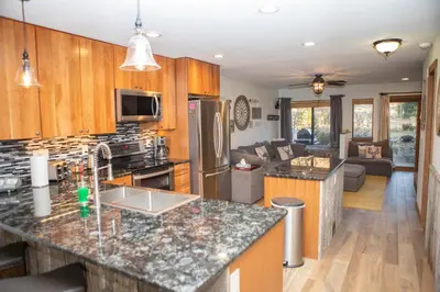 a kitchen and living room with a counter top at 1221 Keystone Gulch condo in Keystone