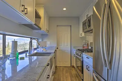 a kitchen with a sink and a counter top at Ski, Shred and Tube Mtn-View Condo in Silverthrone! in Silverthorne