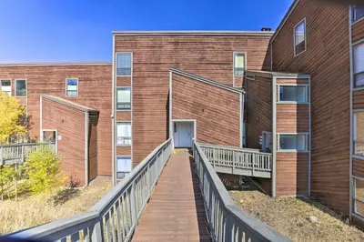 a brick building with a ramp leading to a door at Ski, Shred and Tube Mtn-View Condo in Silverthrone! in Silverthorne