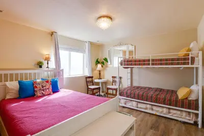 a bedroom with a bunk bed and a desk at 8 Mi to Copper Mtn Dtwn Frisco Retreat with Deck! in Frisco