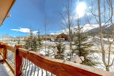 a view from the deck of a house in the snow at Frisco Frolic in Frisco