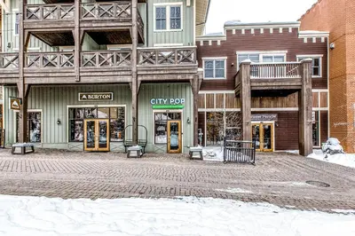 a cityastery with a citypod store in the snow at Founders Pointe Condo in Winter Park
