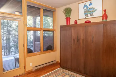 a room with a wooden cabinet and a window at 1934 Soda Springs condo in Dillon